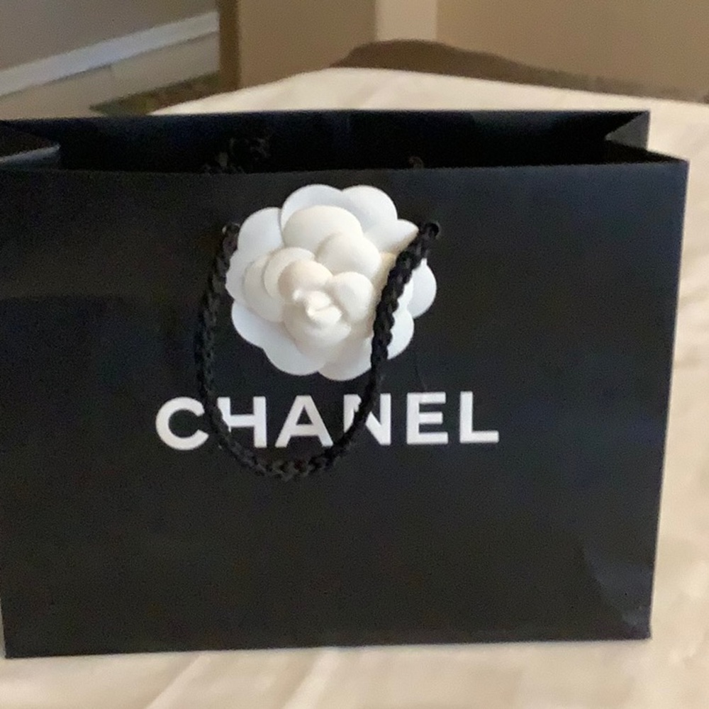 CHANEL Black Bag with White Camellia